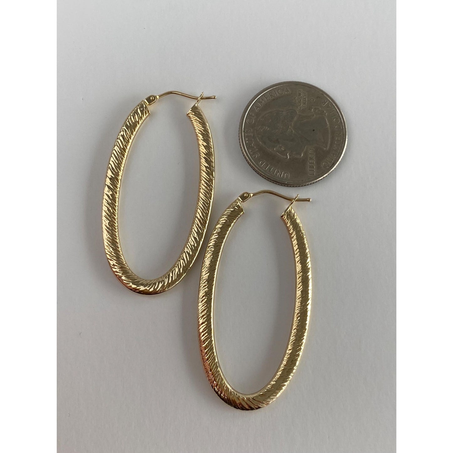 Vintage 14k Yellow Gold Long Textured Oval Hoop Earrings