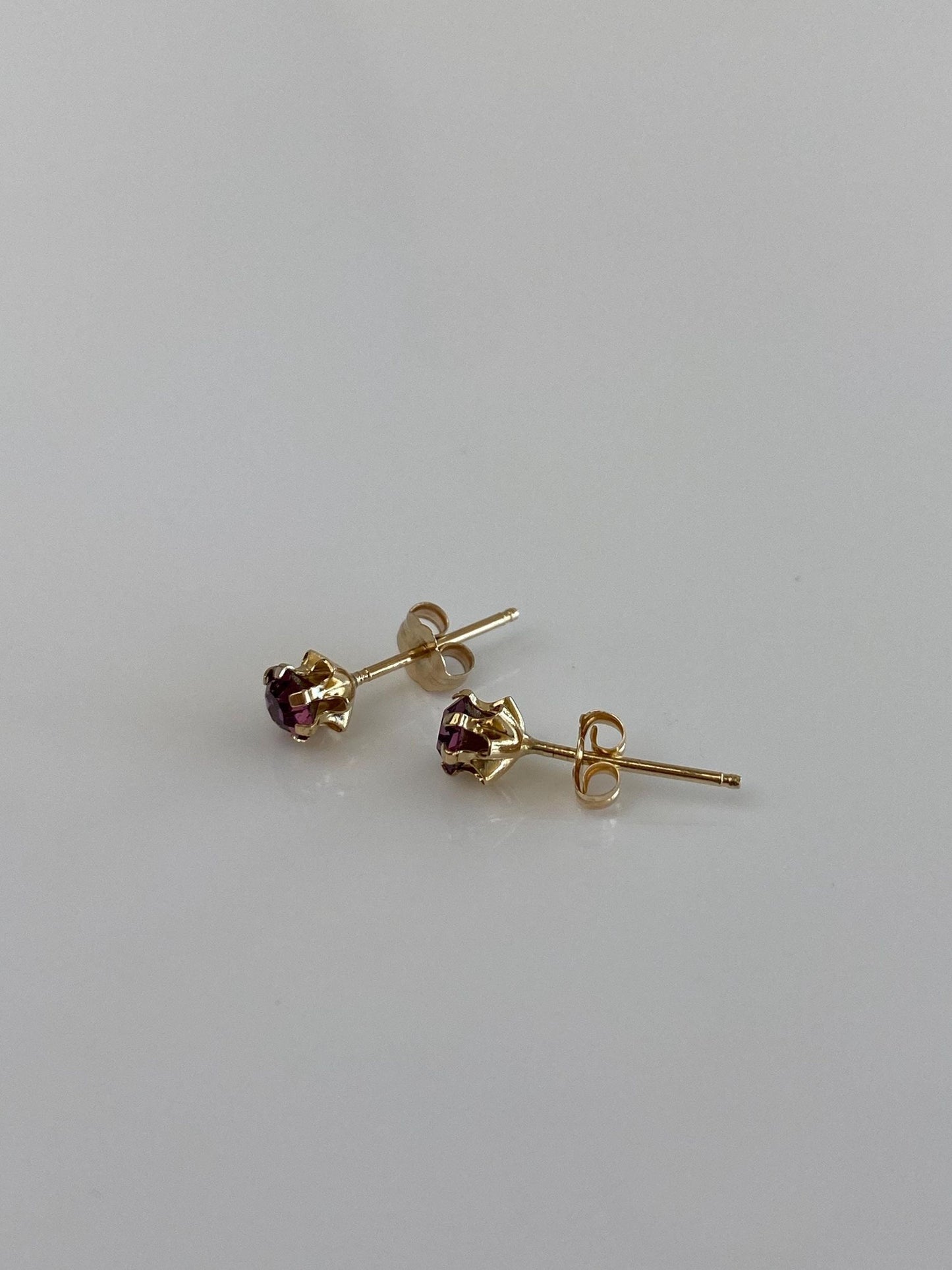 Vintage Solid 14k Yellow Gold Purple Cubic Zirconia Stud Earrings