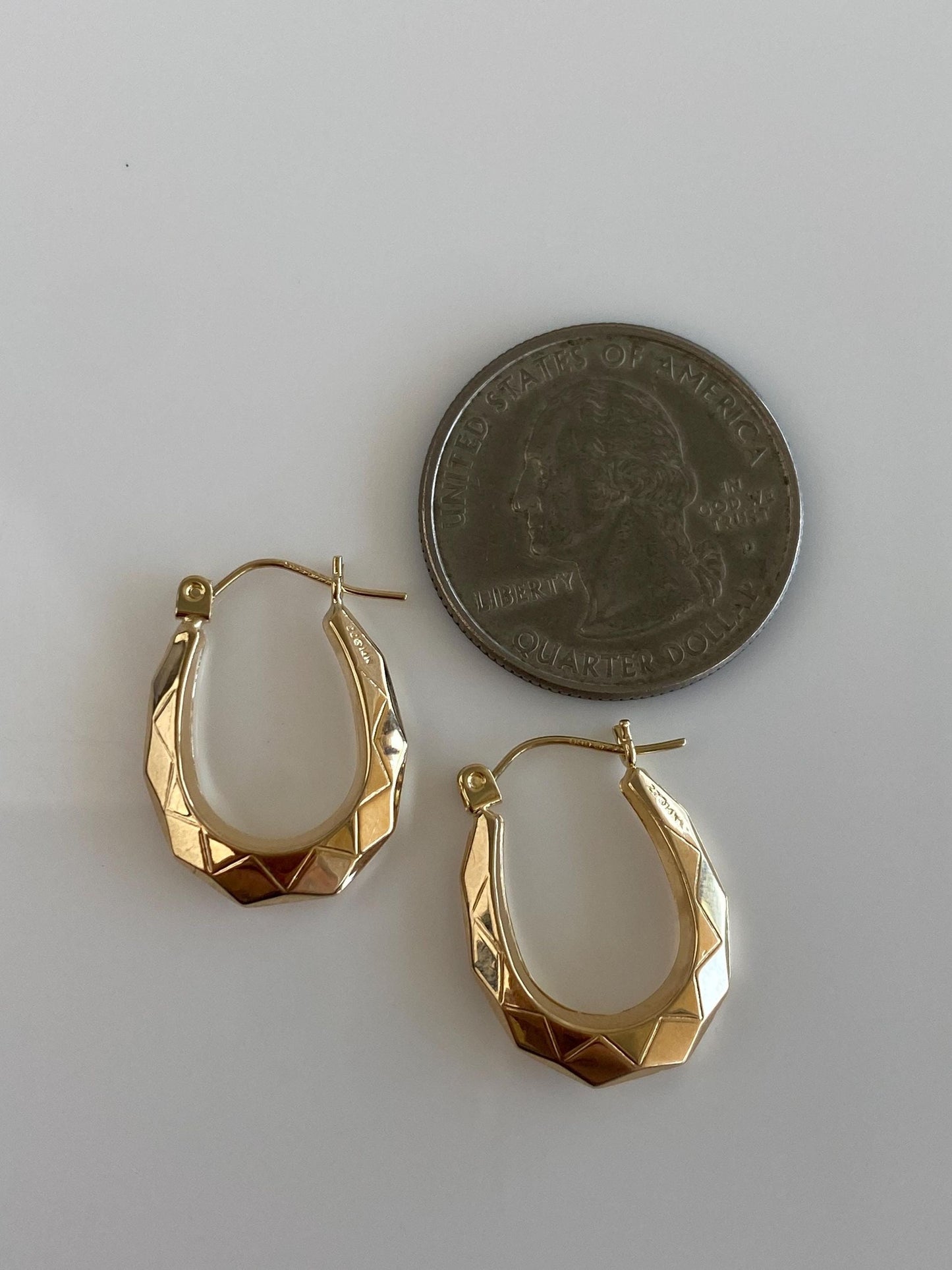 Vintage 14k Yellow Gold Faceted Oval Hoop Earrings