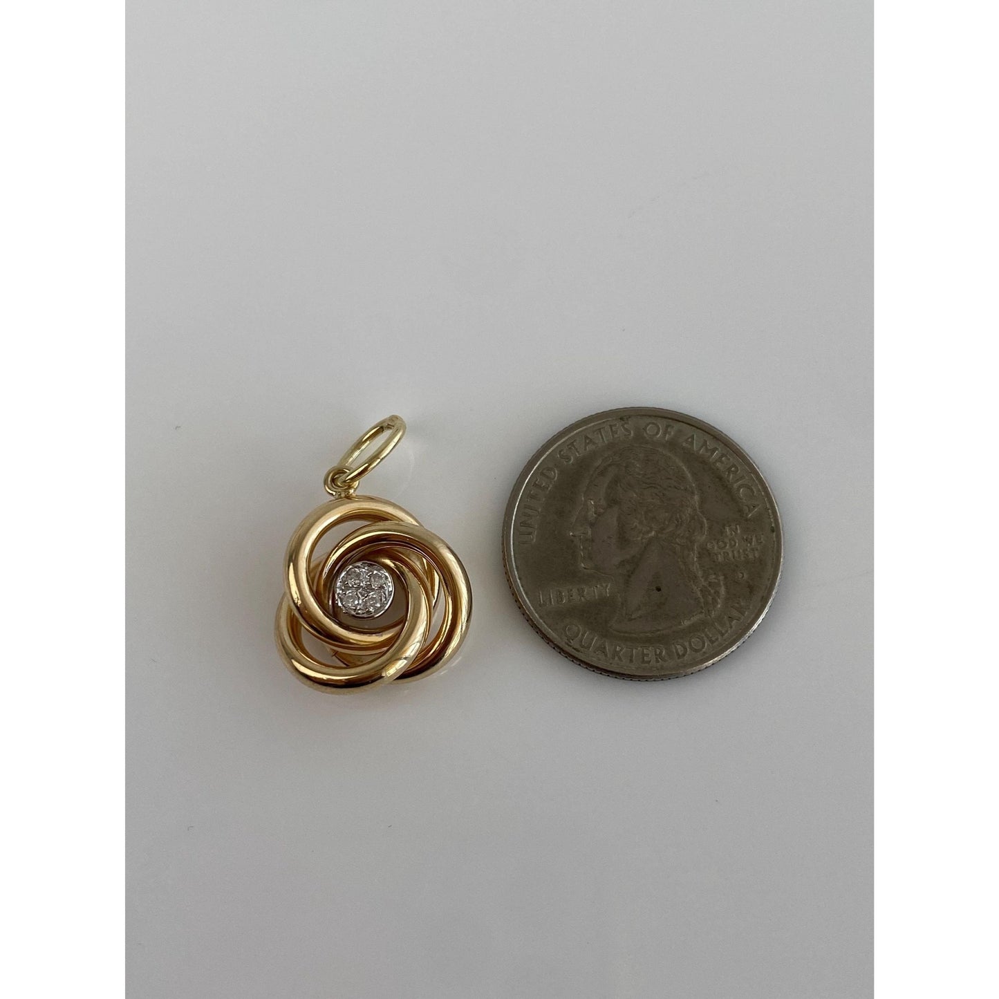 Vintage 14k Yellow Gold Clear Sapphire Knot Charm