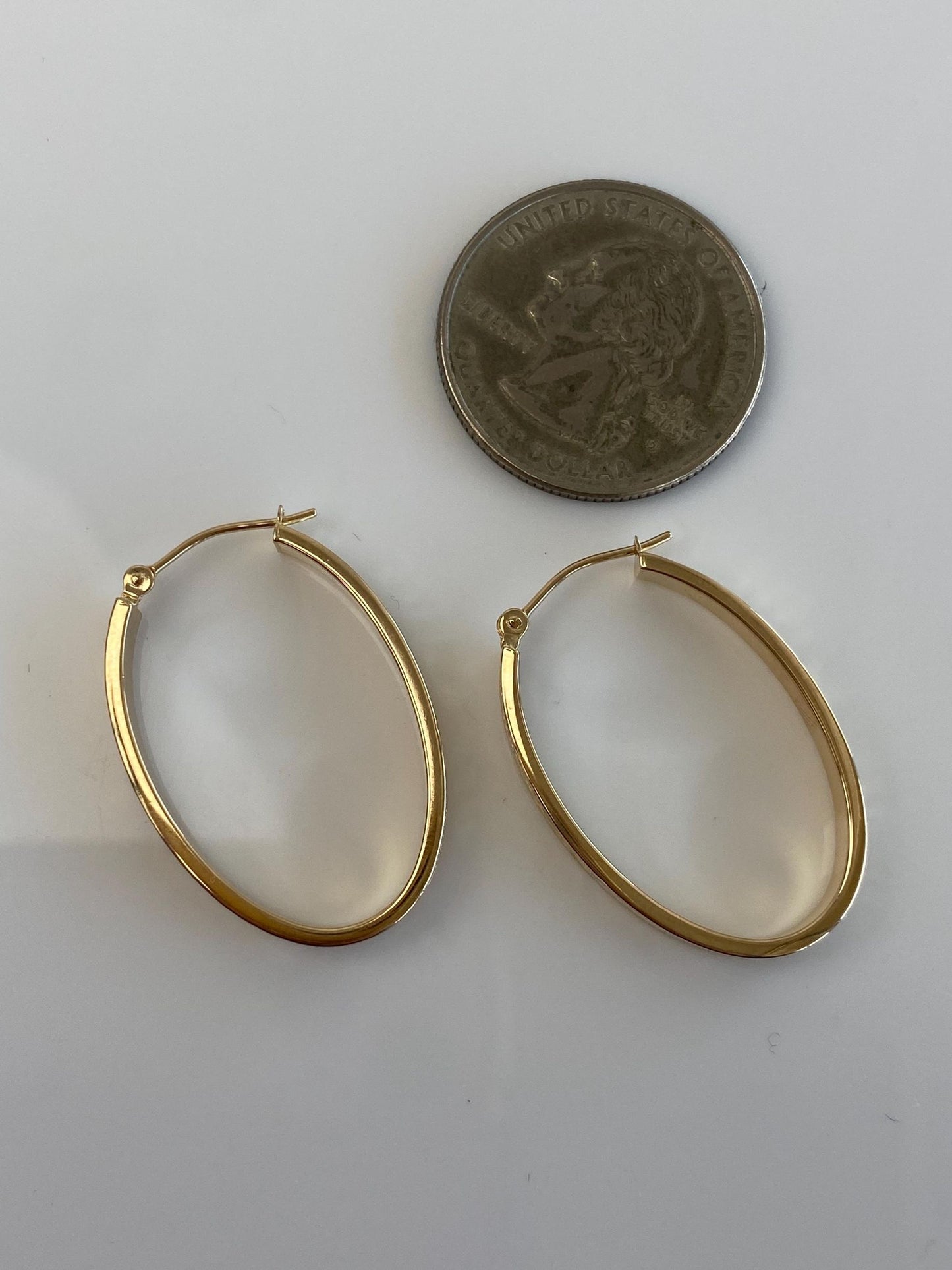 Vintage 14k Yellow Gold Diamond Cut Oval Hoop Earrings