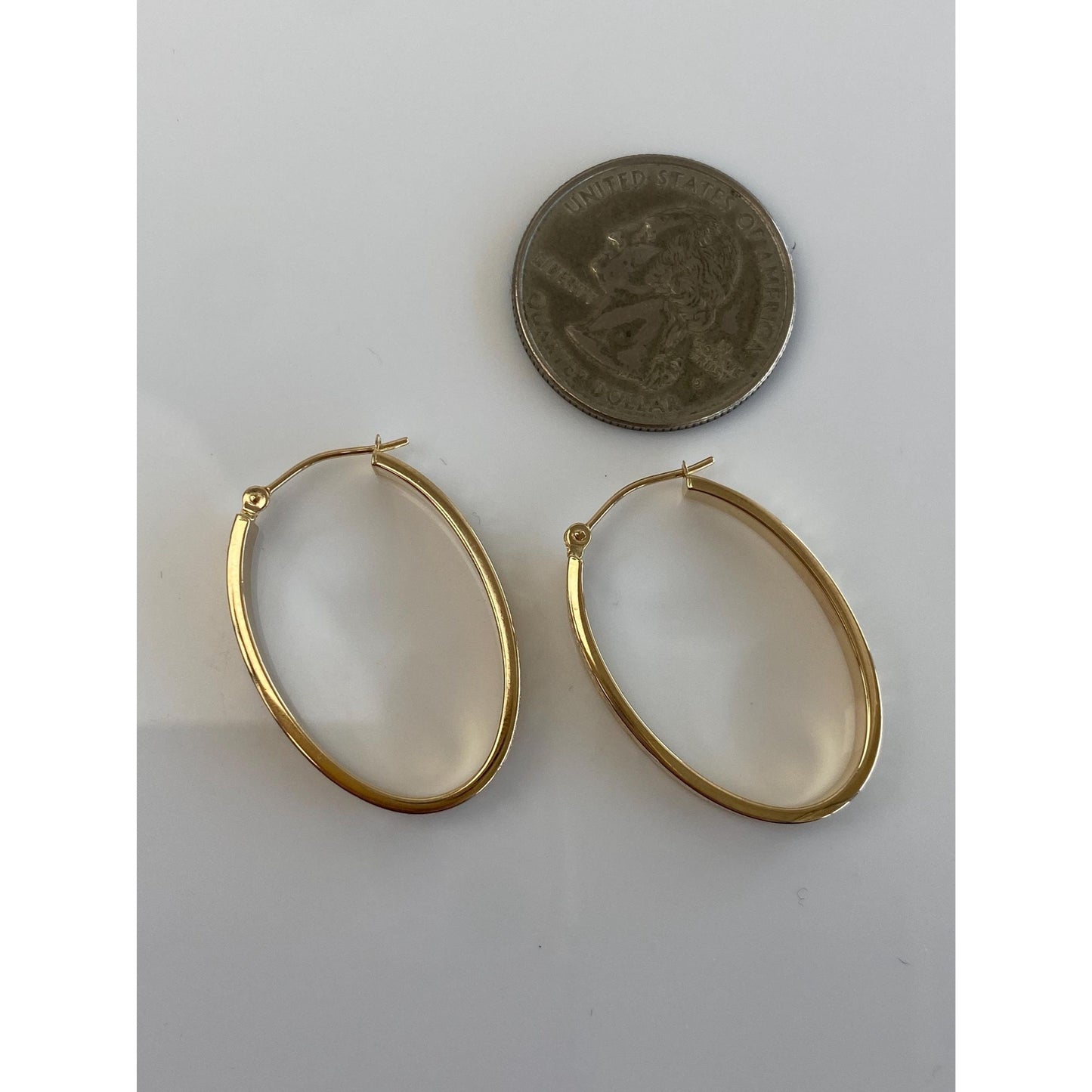 Vintage 14k Yellow Gold Diamond Cut Oval Hoop Earrings
