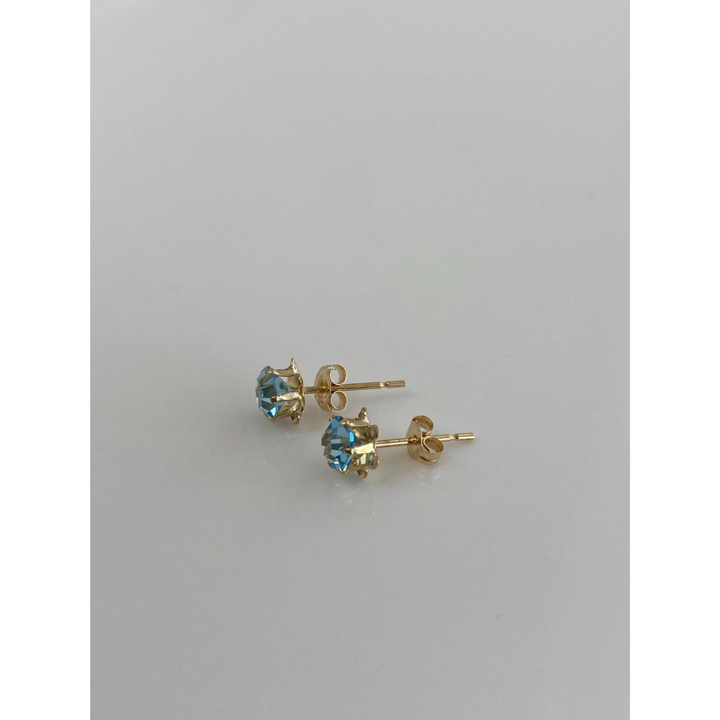 Solid 14k Yellow Gold Light Blue Cubic Zirconia Stud Earrings
