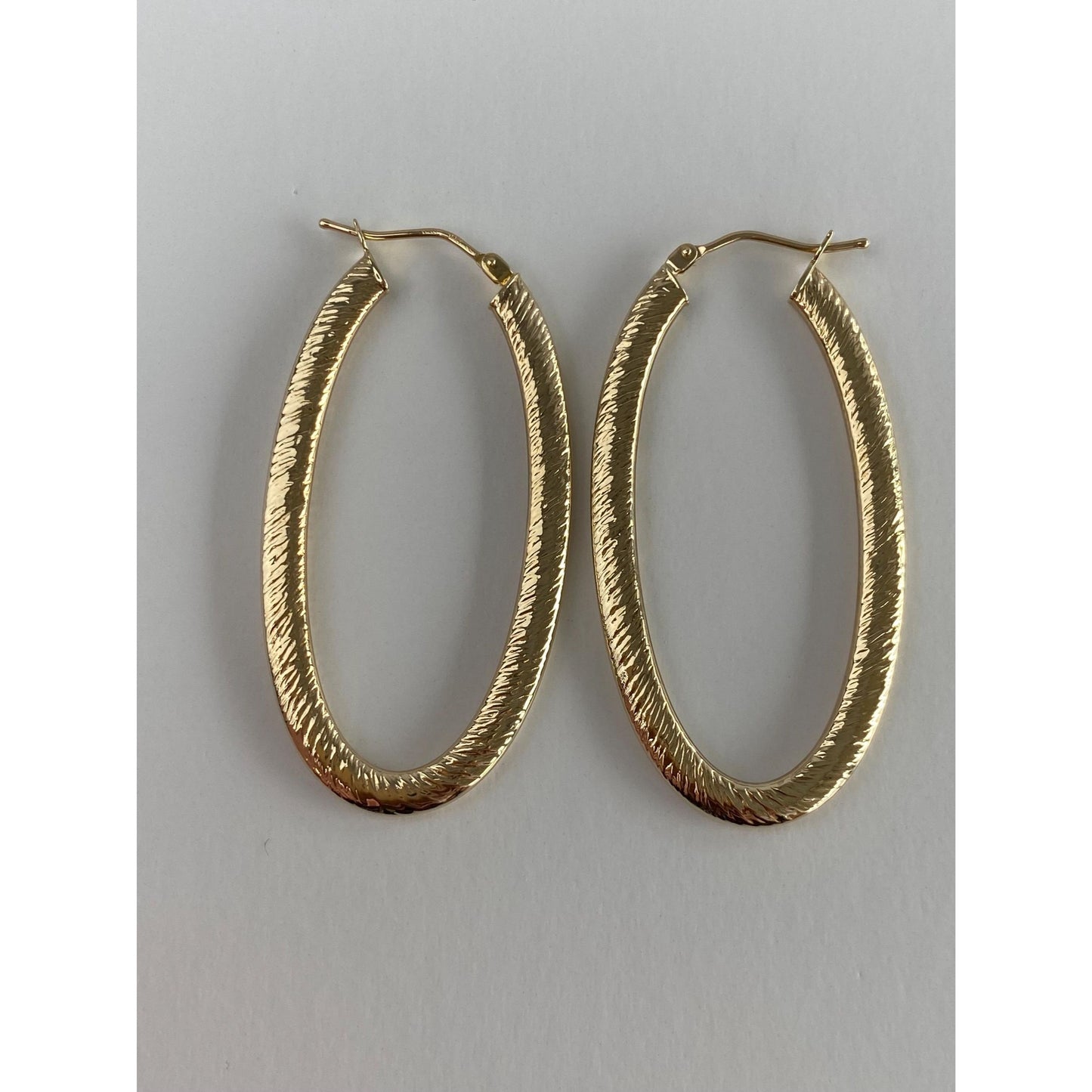Vintage 14k Yellow Gold Long Textured Oval Hoop Earrings