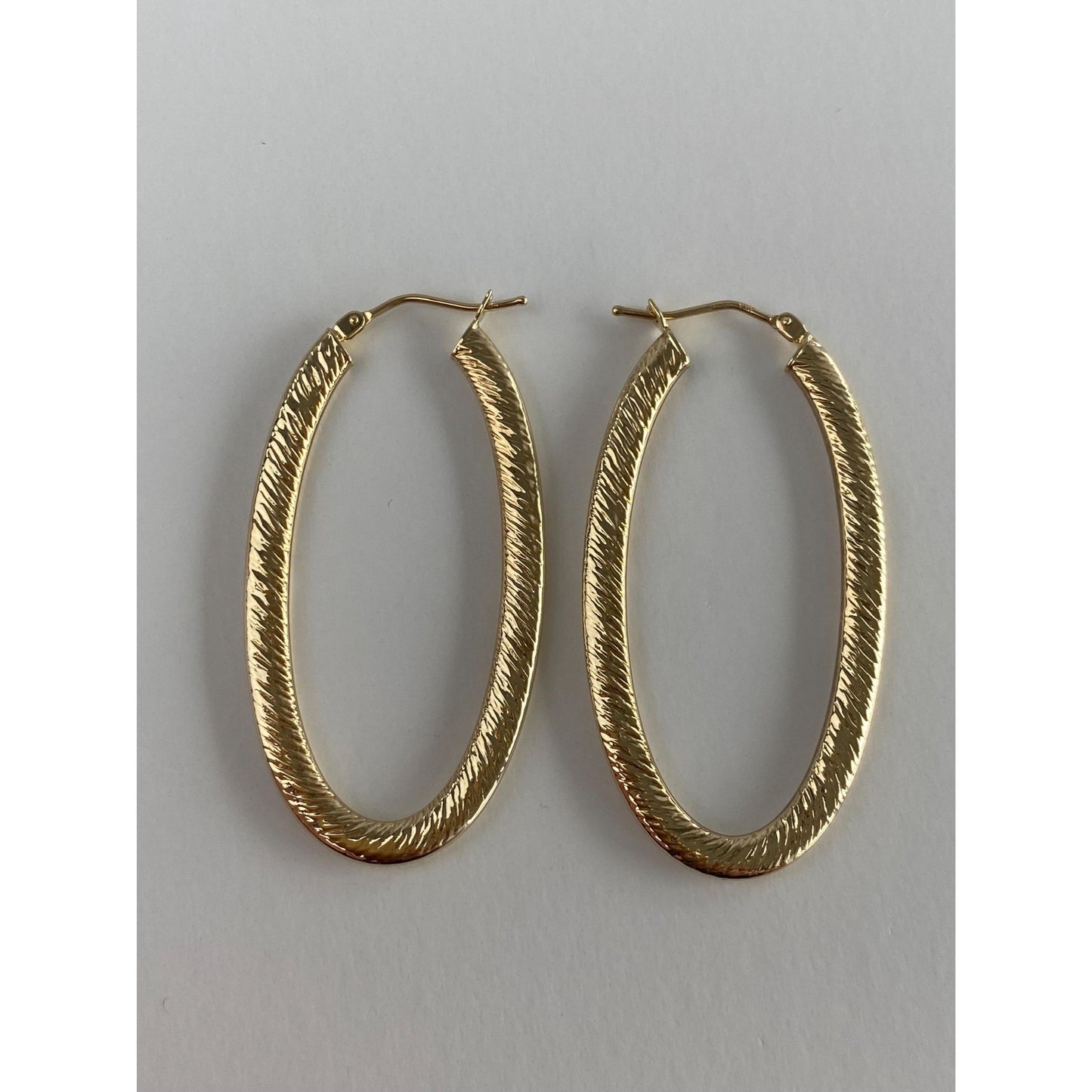 Vintage 14k Yellow Gold Long Textured Oval Hoop Earrings