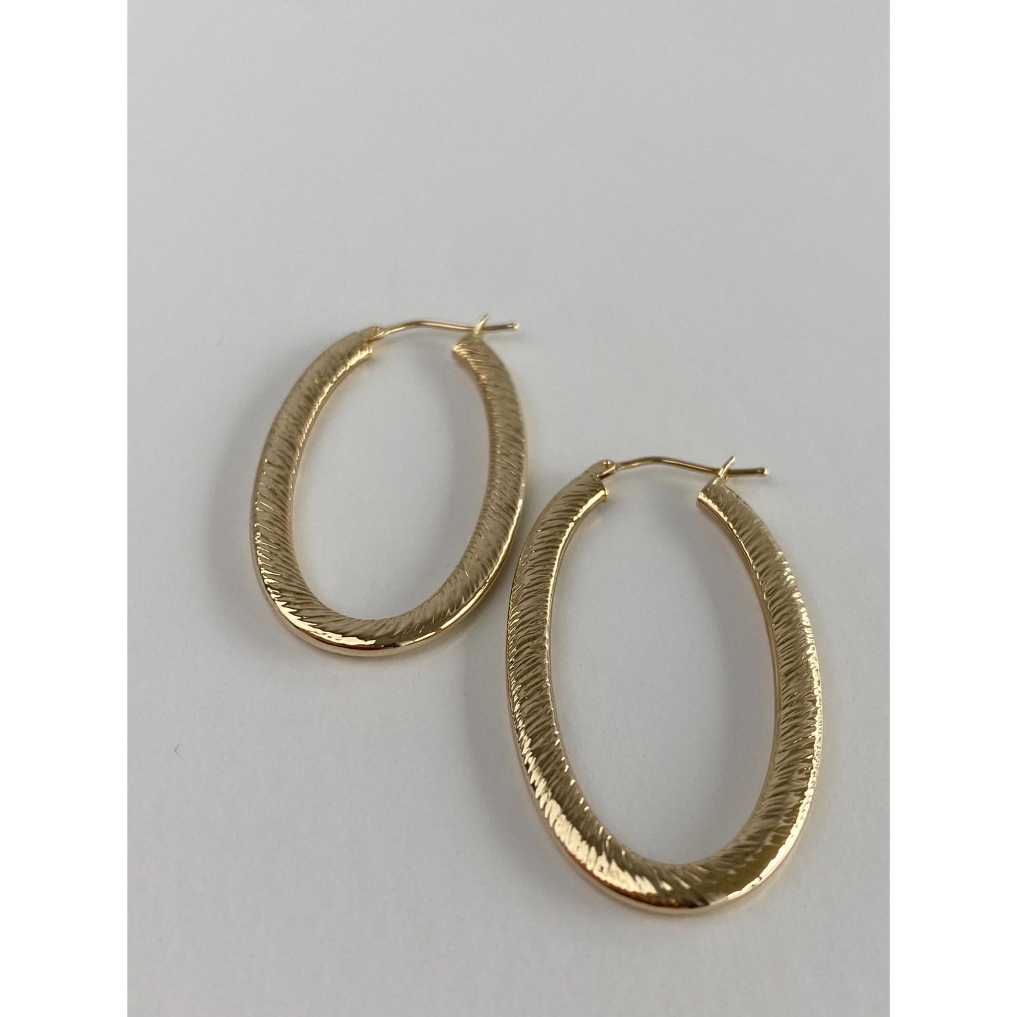 Vintage 14k Yellow Gold Long Textured Oval Hoop Earrings