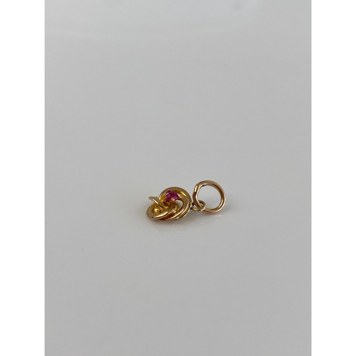 Vintage Solid 10k Yellow Gold Pink Sapphire Knot Charm