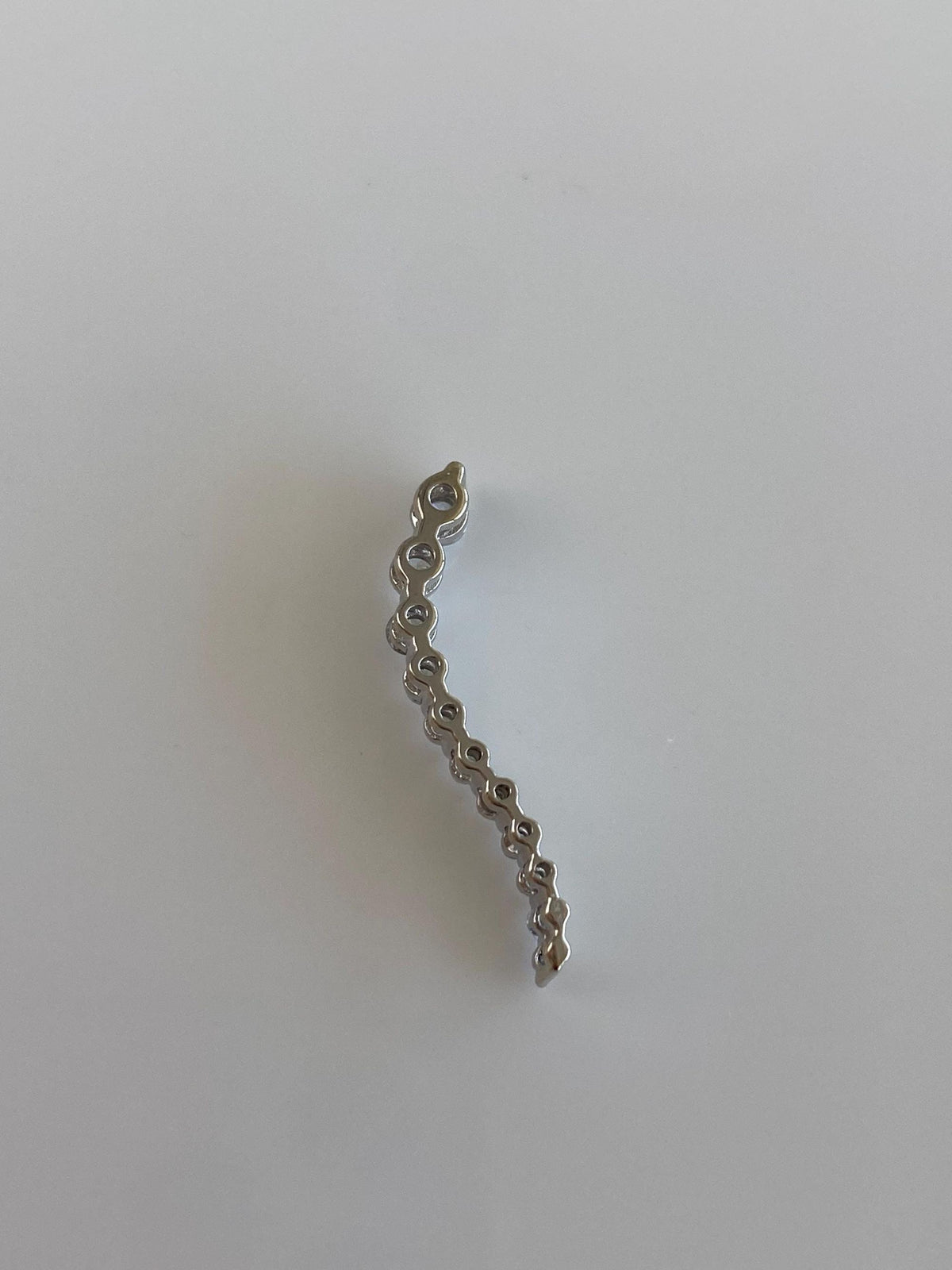 Solid 10k White Gold Clear Sapphire Swirl Charm