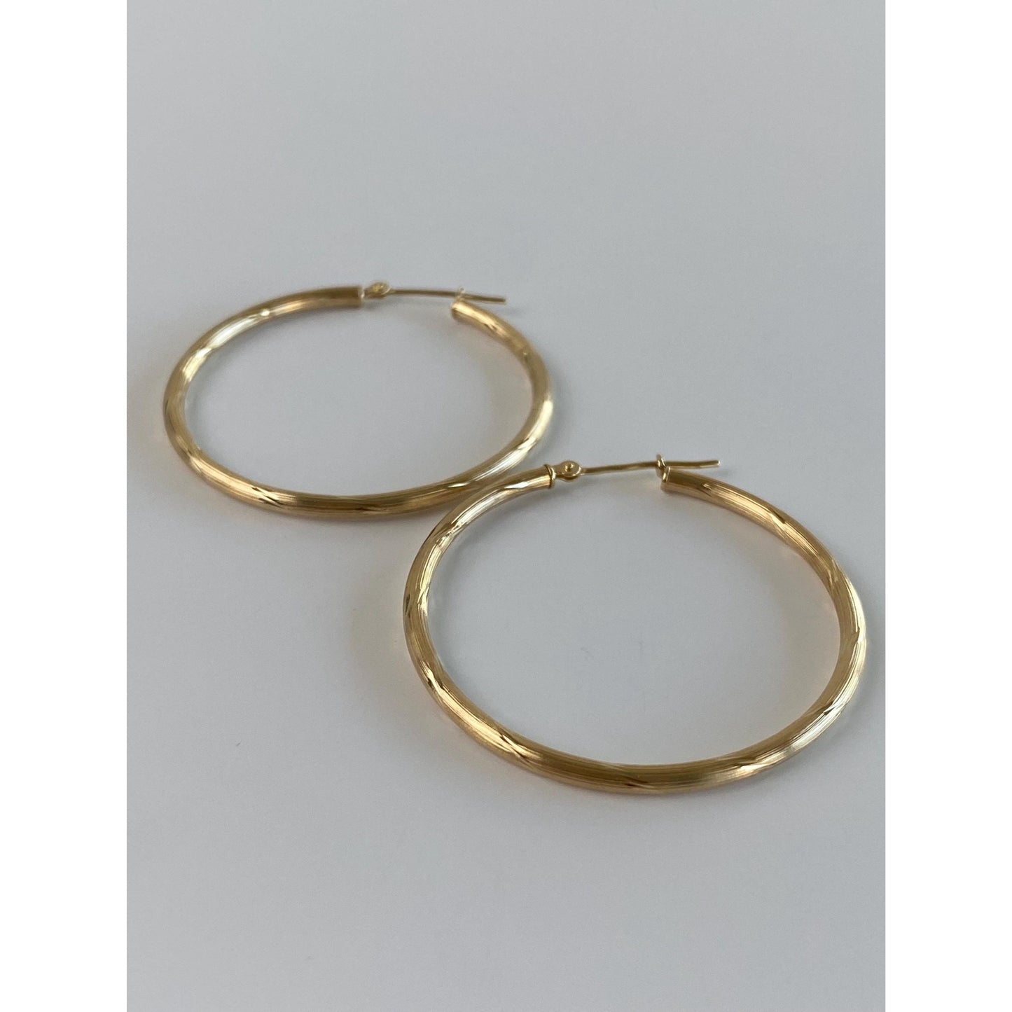 Vintage 14k Yellow Gold Diamond Cut Hoop Earrings