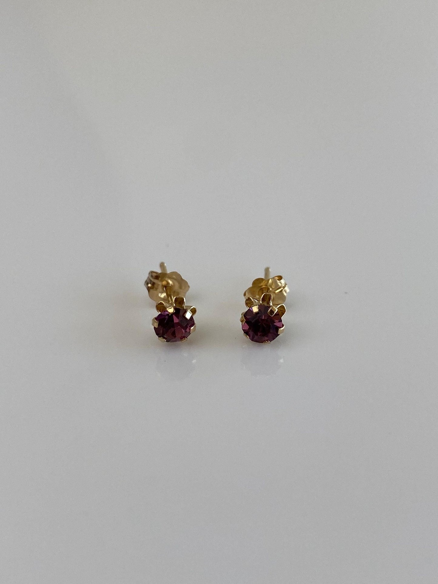 Vintage Solid 14k Yellow Gold Purple Cubic Zirconia Stud Earrings