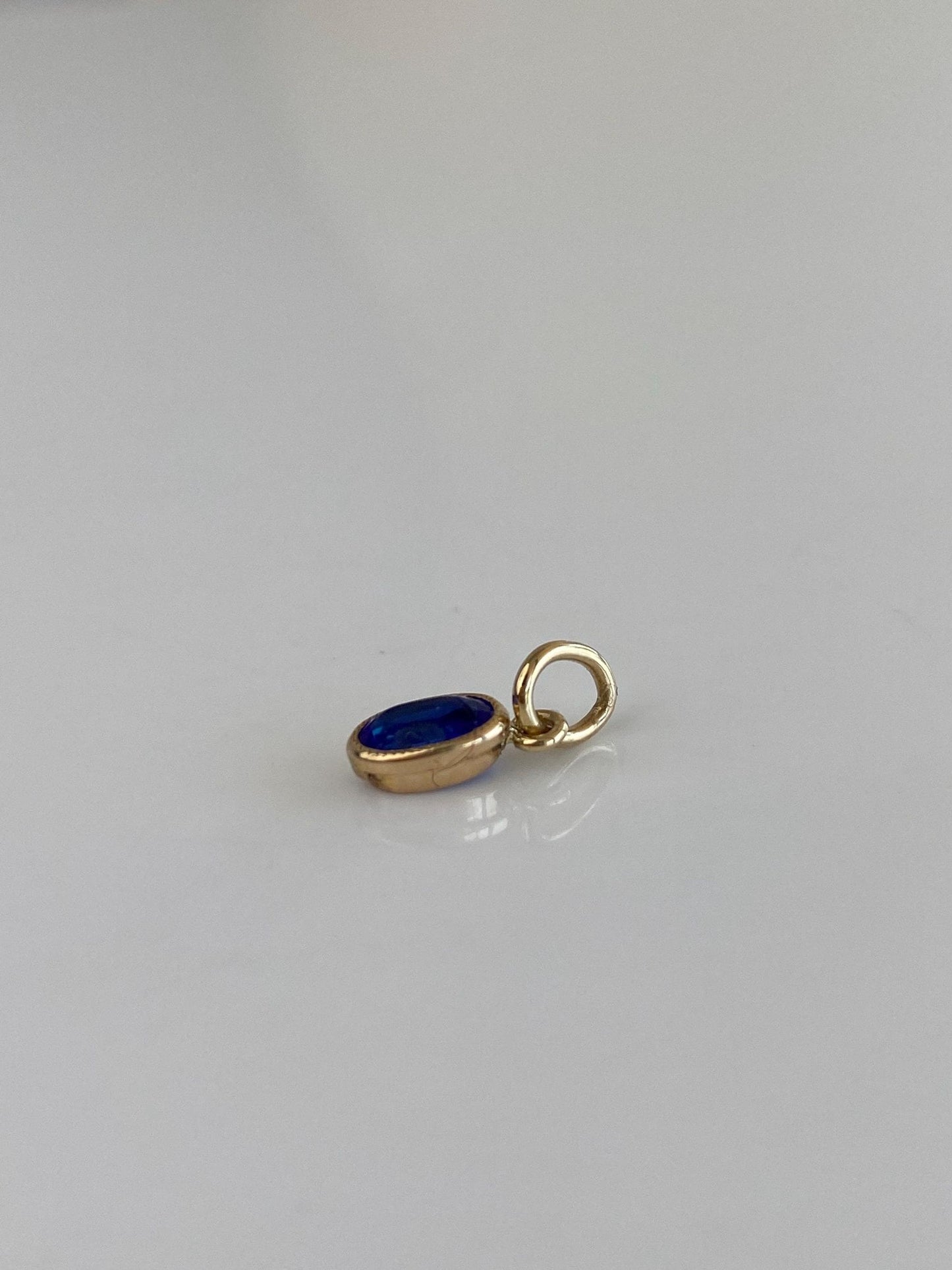 Vintage Solid 10k Yellow Gold Blue Cubic Zirconia Charm