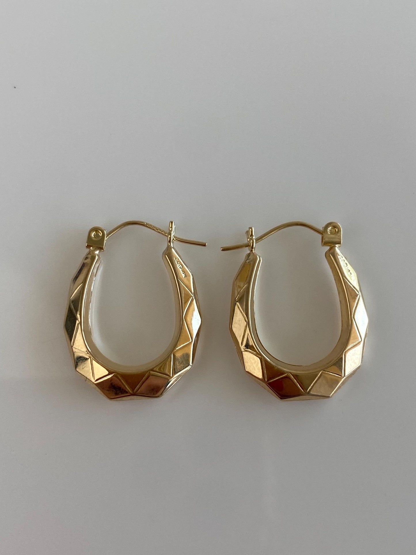 Vintage 14k Yellow Gold Faceted Oval Hoop Earrings
