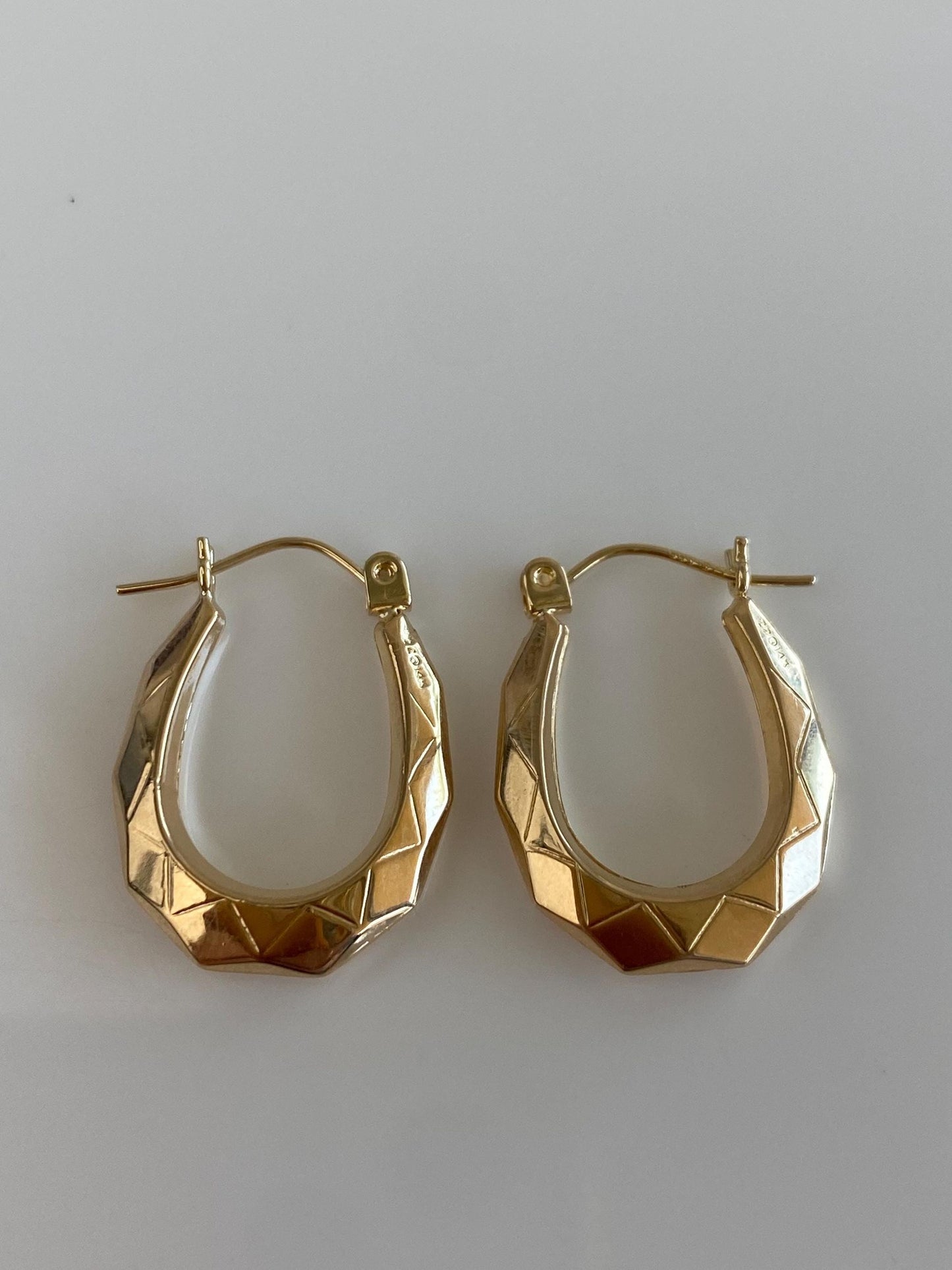 Vintage 14k Yellow Gold Faceted Oval Hoop Earrings