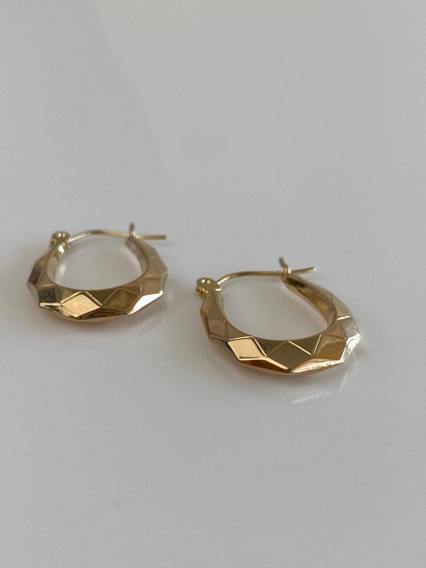 Vintage 14k Yellow Gold Faceted Oval Hoop Earrings