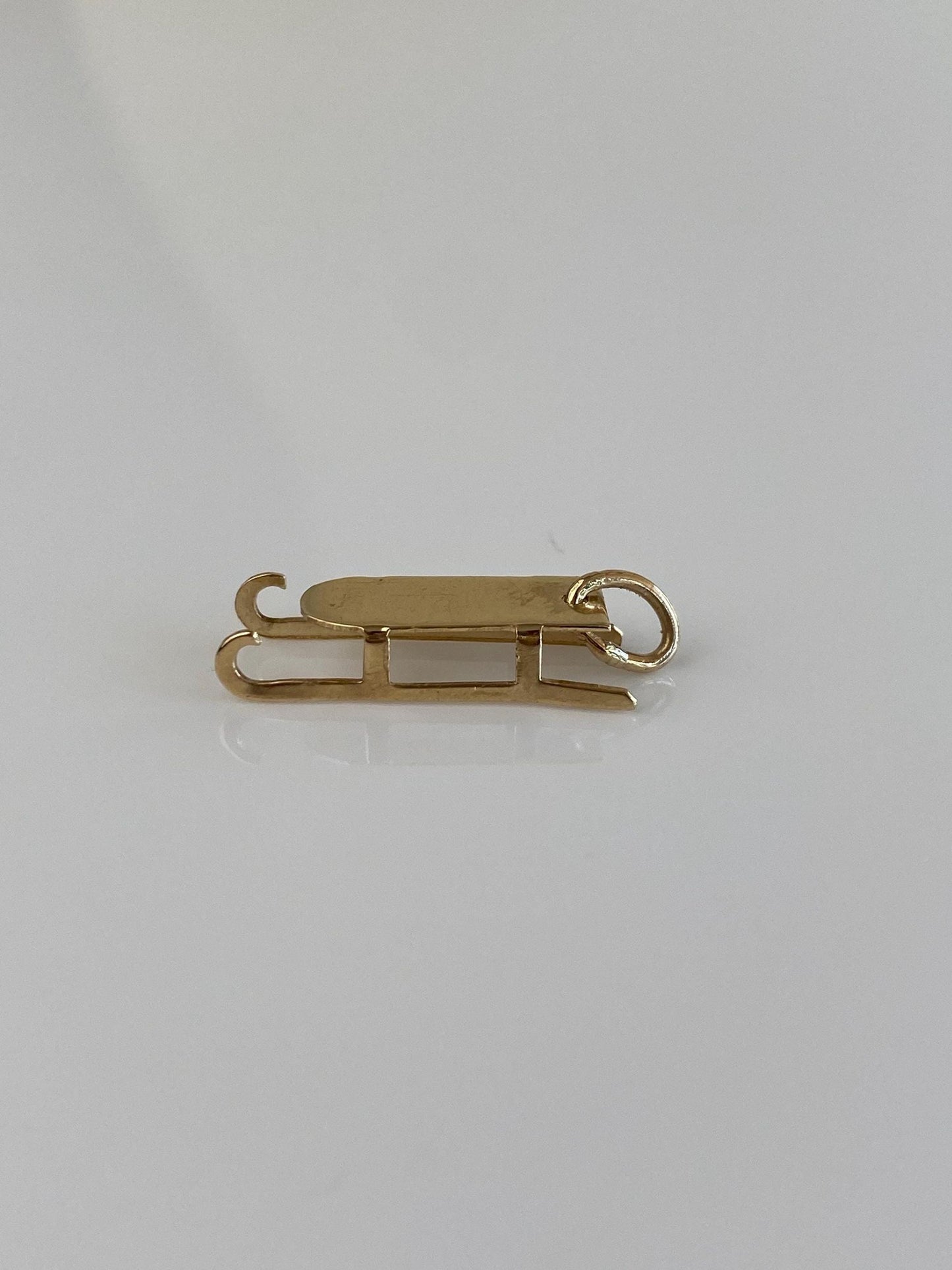 Vintage Solid 9k Yellow Gold Sled Charm