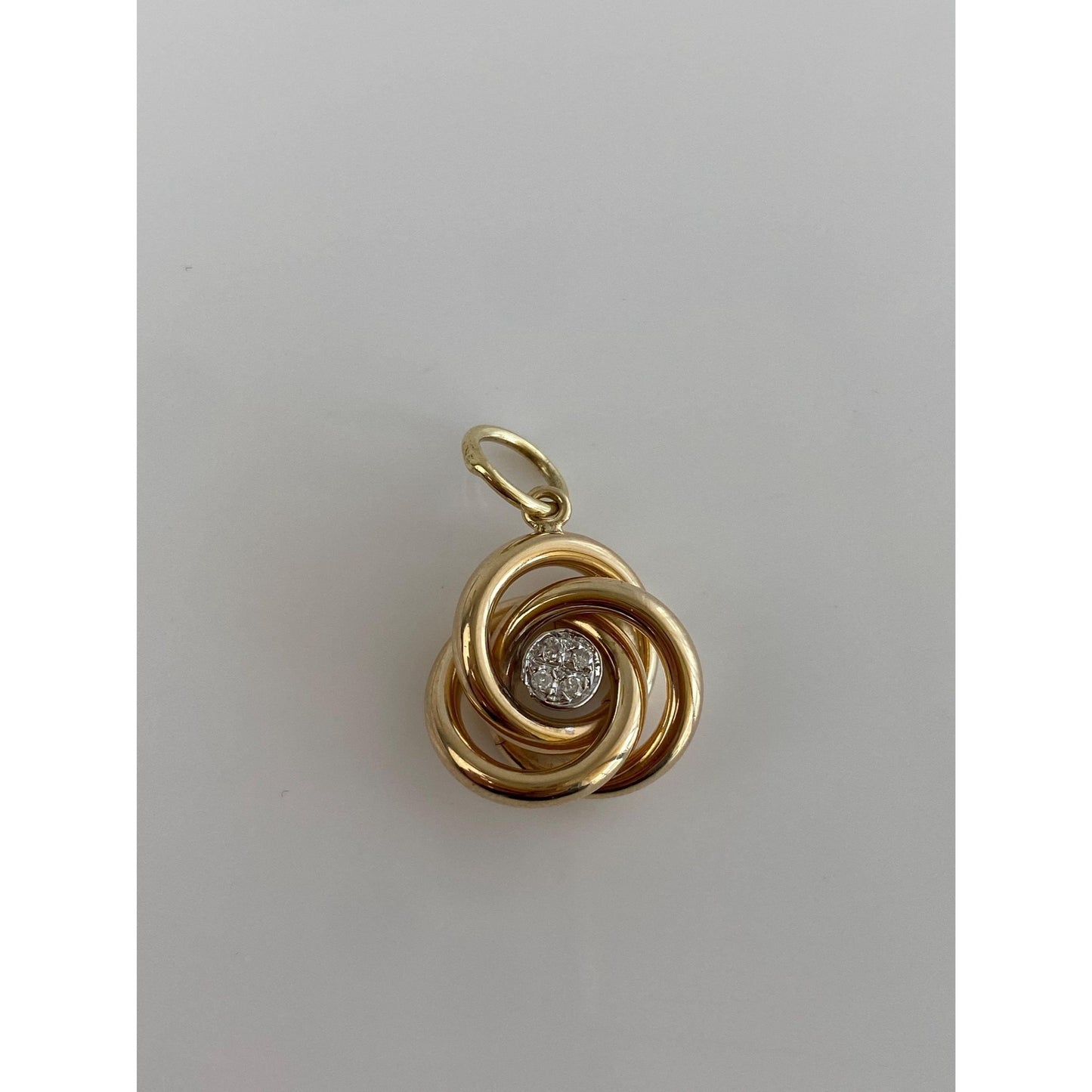 Vintage 14k Yellow Gold Clear Sapphire Knot Charm