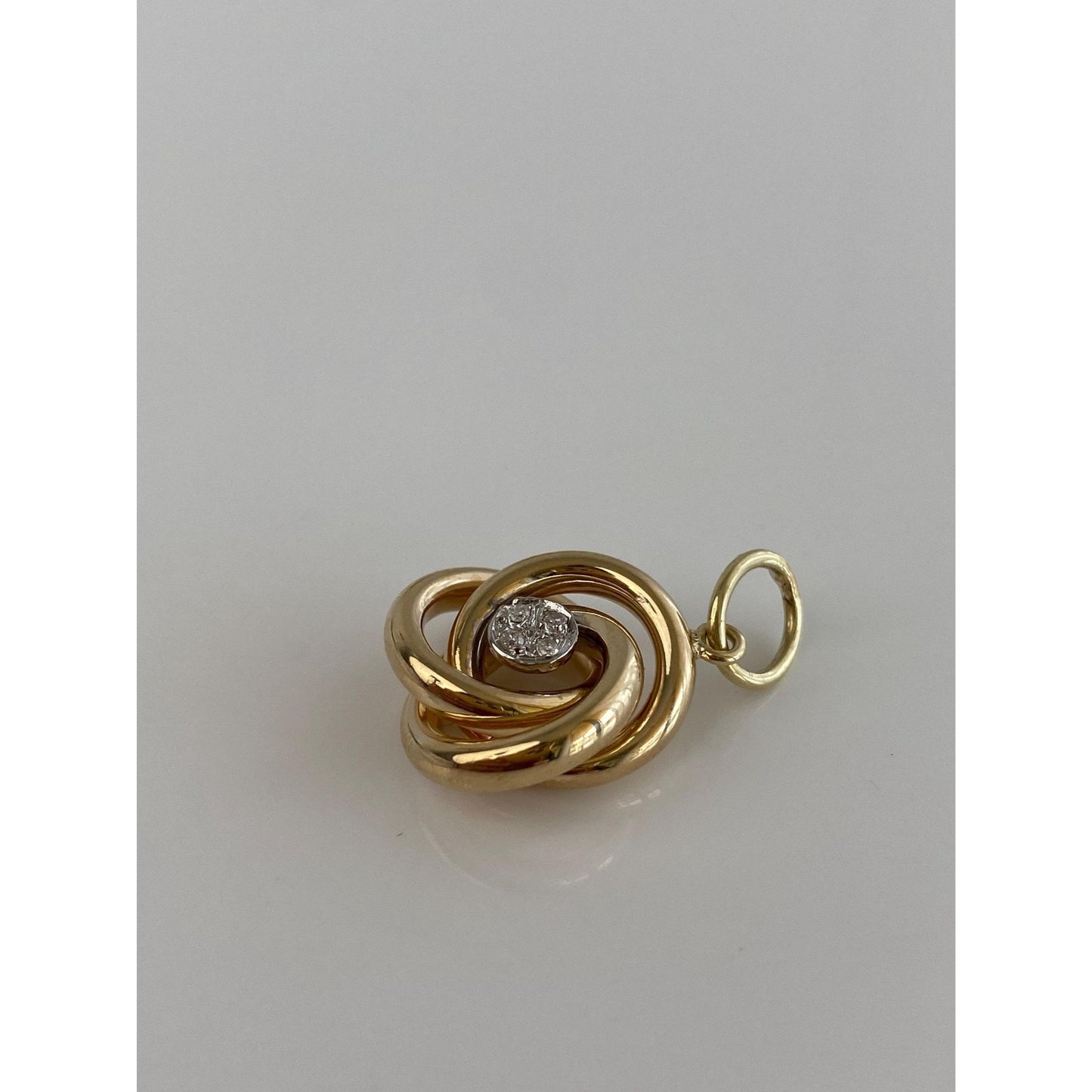 Vintage 14k Yellow Gold Clear Sapphire Knot Charm