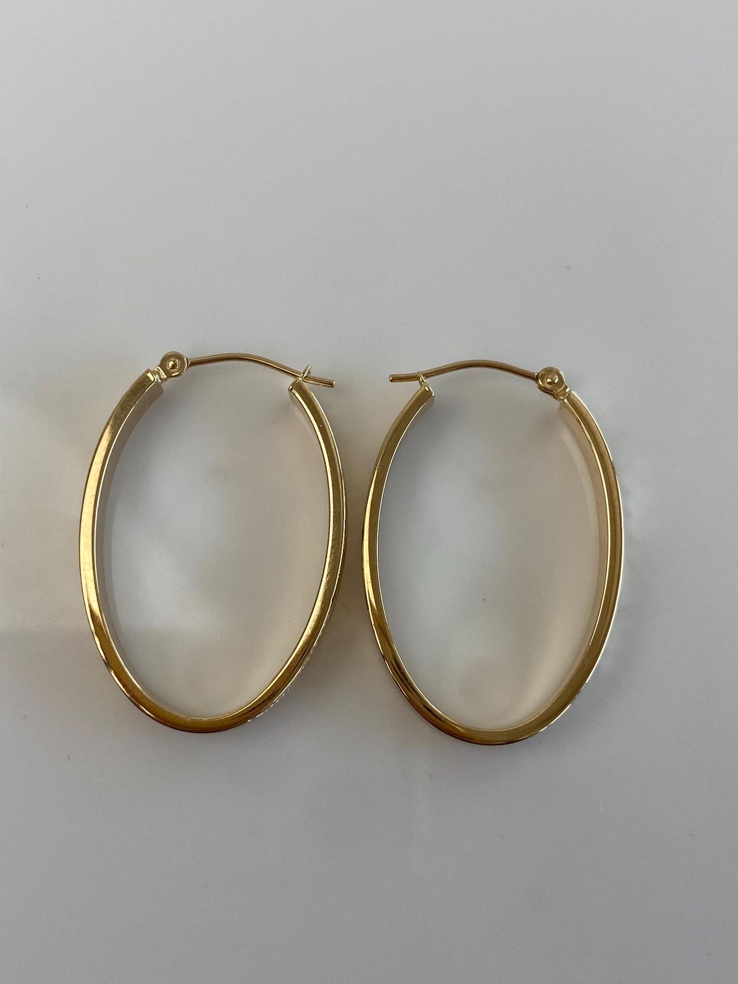 Vintage 14k Yellow Gold Diamond Cut Oval Hoop Earrings
