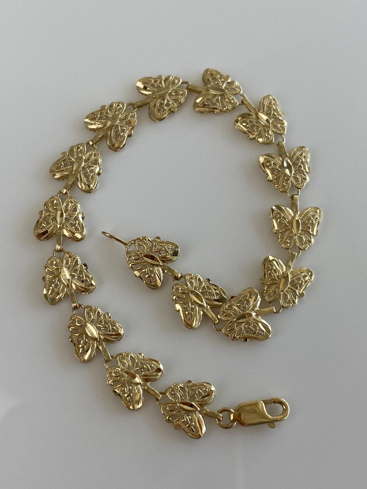 Solid 10k Yellow Gold Diamond Cut Butterfly Link Bracelet - 7.25 inches