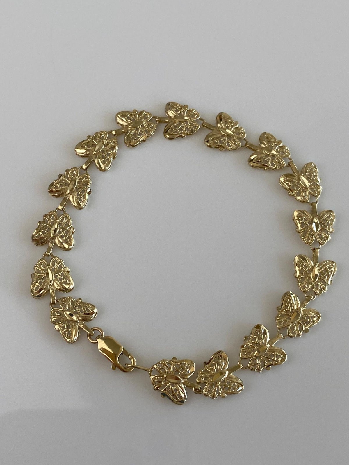 Solid 10k Yellow Gold Diamond Cut Butterfly Link Bracelet - 7.25 inches