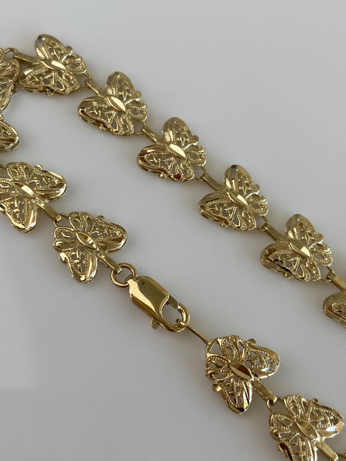 Solid 10k Yellow Gold Diamond Cut Butterfly Link Bracelet - 7.25 inches