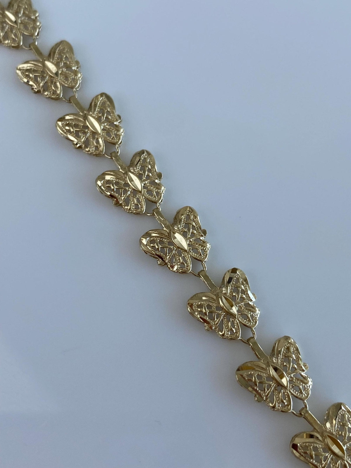 Solid 10k Yellow Gold Diamond Cut Butterfly Link Bracelet - 7.25 inches