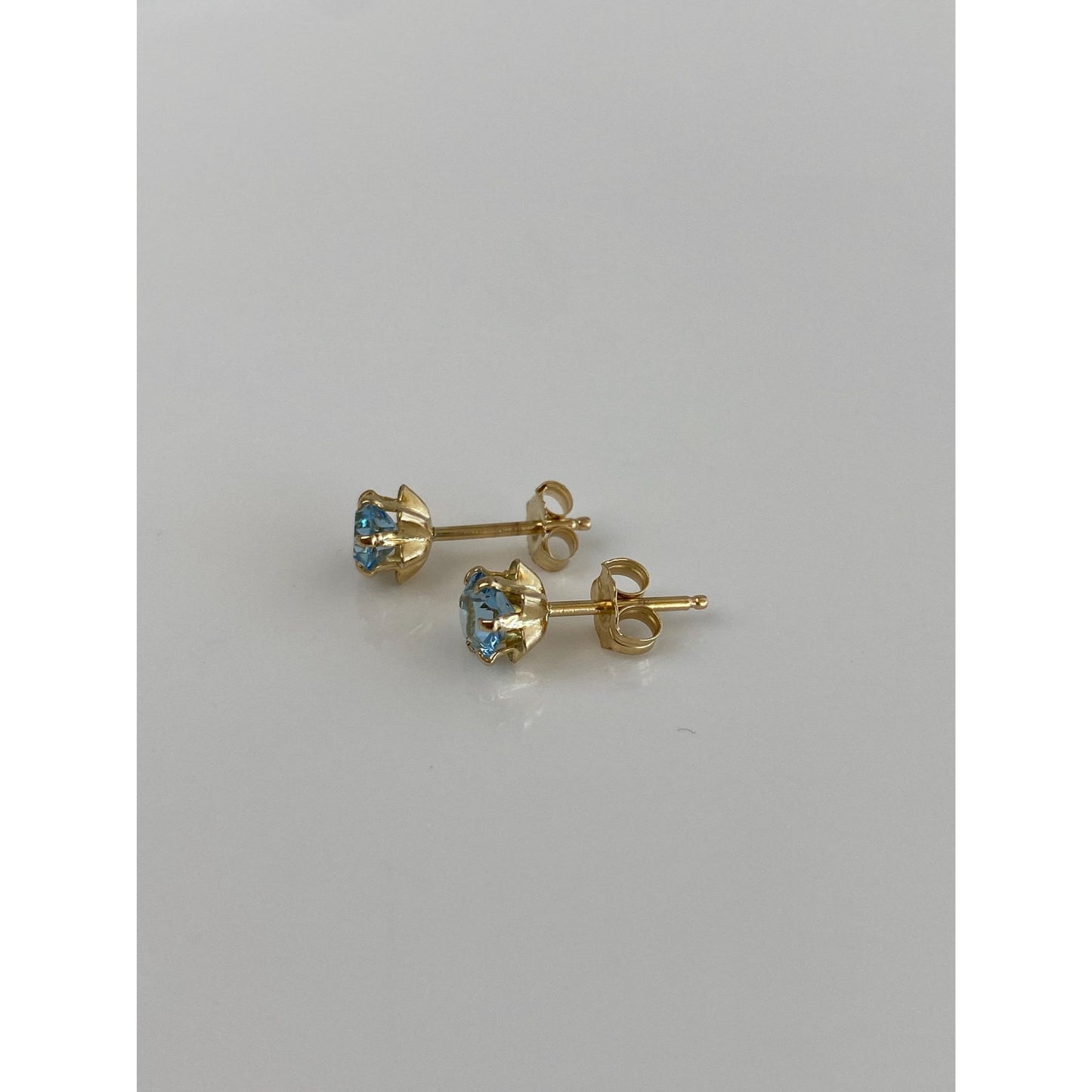Solid 14k Yellow Gold Light Blue Cubic Zirconia Stud Earrings