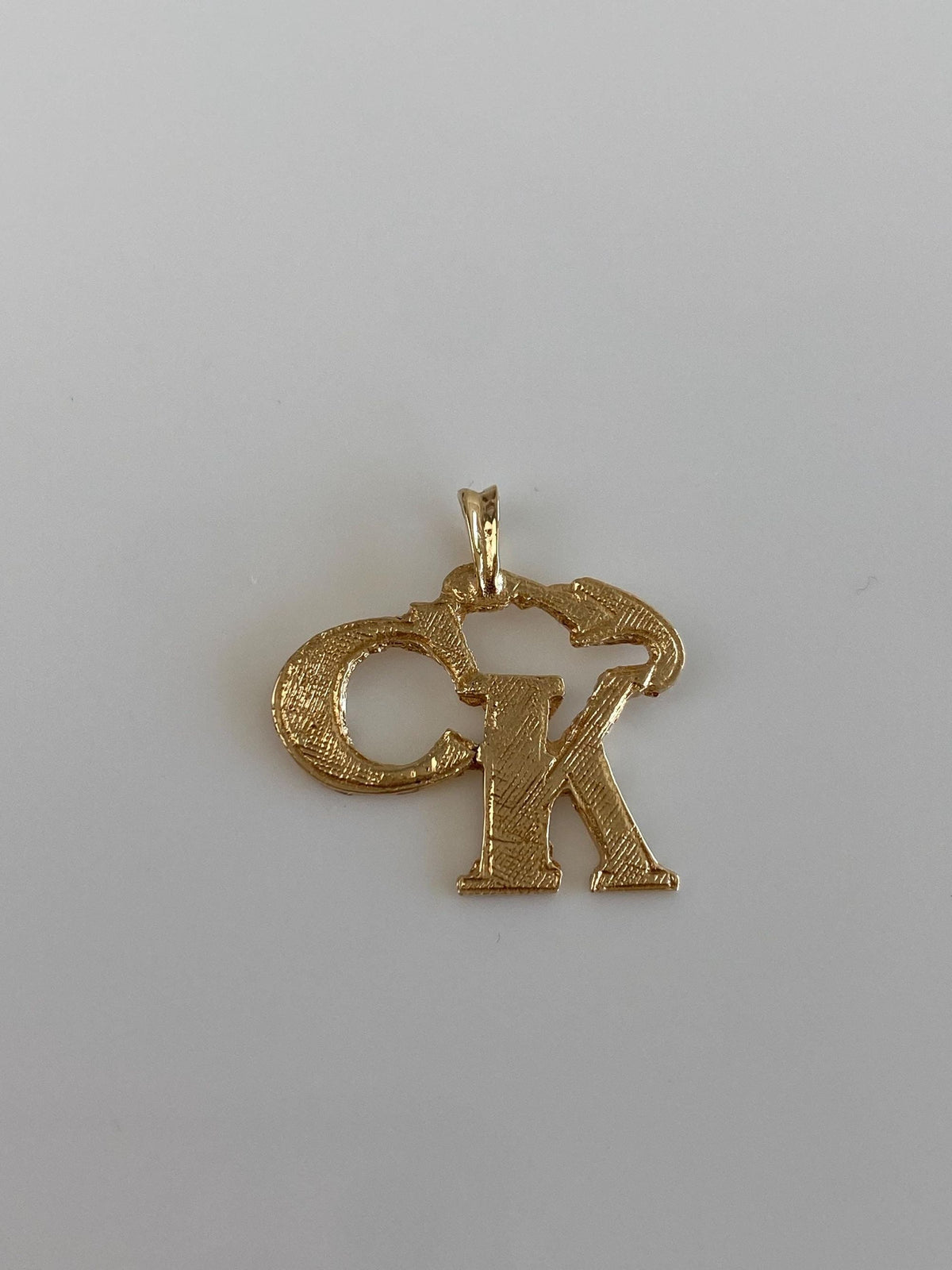 Vintage Solid 12k Yellow Gold CK Charm