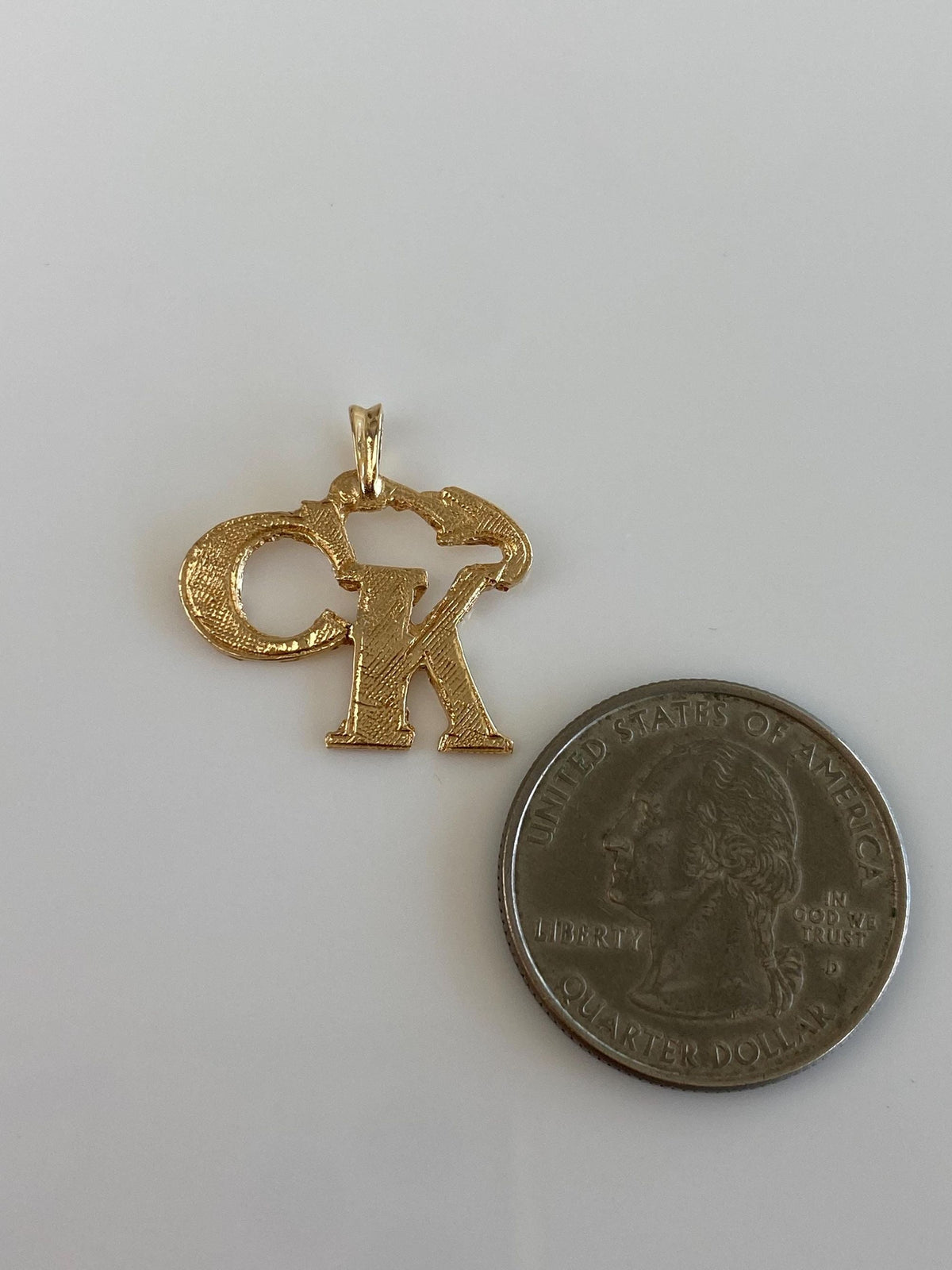 Vintage Solid 12k Yellow Gold CK Charm